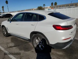 2020 BMW X4 xDrive30i with VIN 5UX2V1C09L9B97540, listed as a Copart auction lot 73984983 with 64,343 mi miles. Bid and sale history available at carsss.com. Image 2.