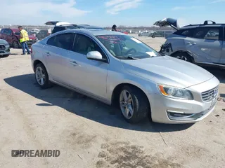 2015 Volvo S60 T5 Drive-E Premier with VIN YV140MFK6F2338415, listed as a IAAI auction lot 41631412 with 95,626 mi miles. Bid and sale history available at carsss.com. Image 1.