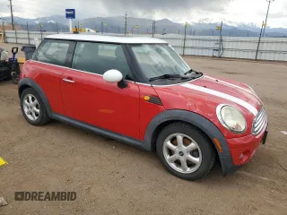 2007 MINI Hardtop with VIN WMWMF33517TT56956, listed as a Copart auction lot 56663985 with 121,729 mi miles and Clean title. Bid and sale history available at DreamBid. Image 4.
