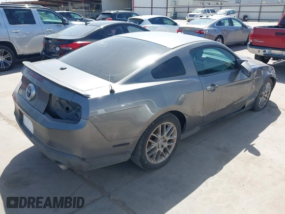 2012 Ford Mustang Premium with VIN 1ZVBP8AM5C5275503, listed as a IAAI auction lot 41732075 with 176,990 mi miles and . Bid and sale history available at DreamBid. Image 4.