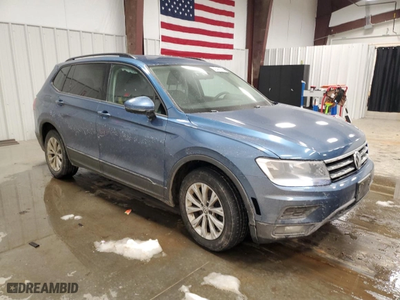 2018 Volkswagen Tiguan S with VIN 3VV0B7AX9JM034033, listed as a Copart auction lot 43441295 with 127,719 mi miles and Salvage Title. Bid and sale history available at carsss.com. Image 4.