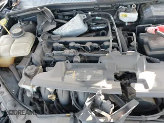 2007 Ford Focus S z VIN 1FAHP34N07W360761, wystawiony jako IAAI lot #40754946 z przebiegiem 121 371 mil mil oraz . Historia ofert i sprzedaży dostępna na DreamBid. Obrazek 10.