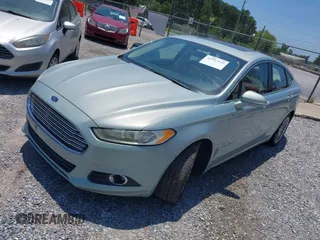 2013 Ford Fusion SE Hybrid z VIN 3FA6P0LU4DR259073, wystawiony jako IAAI lot #42197143 z przebiegiem 87 337 mil mil oraz . Historia ofert i sprzedaży dostępna na DreamBid. Obrazek 2.
