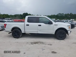 2020 Ford F-150 XL z VIN 1FTEW1EP3LFA05453, wystawiony jako IAAI lot #42644402 z przebiegiem 163 933 mil mil oraz . Historia ofert i sprzedaży dostępna na DreamBid. Obrazek 13.