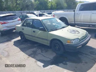 1991 Honda Civic z VIN JHMED3545MS029574, wystawiony jako IAAI lot #42405661 z przebiegiem 181 650 mil mil oraz . Historia ofert i sprzedaży dostępna na DreamBid. Obrazek 1.