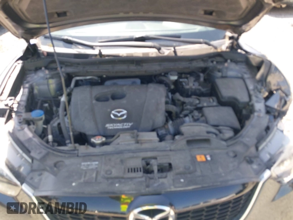 2015 Mazda CX-5 Sport z VIN JM3KE4BY5F0540612, wystawiony jako IAAI lot #42109082 z przebiegiem 83 874 mil mil oraz . Historia ofert i sprzedaży dostępna na DreamBid. Obrazek 10.