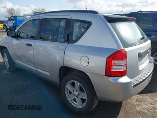 2008 Jeep Compass Sport with VIN 1J8FT47W18D728894, listed as a IAAI auction lot 41925519 with 154,124 mi miles. Bid and sale history available at carsss.com. Image 3.