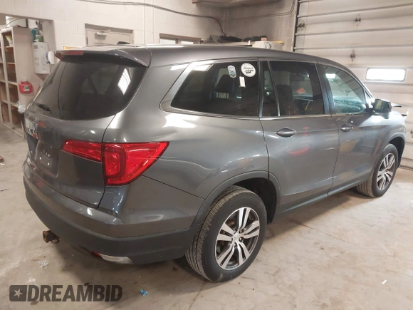 2016 Honda Pilot EX-L with VIN 5FNYF6H51GB097323, listed as a IAAI auction lot 41989978 with 105,006 mi miles. Bid and sale history available at carsss.com. Image 4.