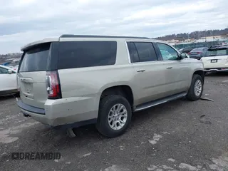 2015 GMC Yukon XL SLT with VIN 1GKS2HKC7FR100534, listed as a IAAI auction lot 41229658 with 207,947 mi miles. Bid and sale history available at carsss.com. Image 4.