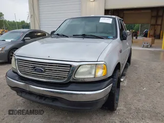 2003 Ford F-150 XL with VIN 1FTRX17253NA74389, listed as a IAAI auction lot 42072045 with 166,572 mi miles. Bid and sale history available at carsss.com. Image 6.
