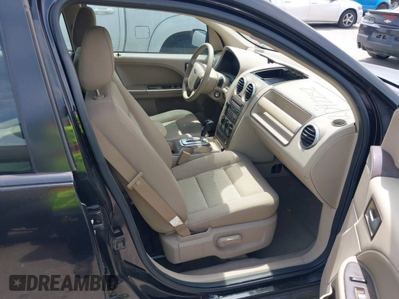 2005 Ford Freestyle SE z VIN 1FMZK01155GA31022, wystawiony jako IAAI lot #42042252 z przebiegiem 138 615 mil mil oraz . Historia ofert i sprzedaży dostępna na DreamBid. Obrazek 5.