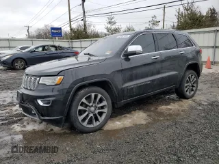2017 Jeep Grand Cherokee Overland with VIN 1C4RJFCGXHC927470, listed as a Copart auction lot 45132185 with 119,543 mi miles and Salvage Title. Bid and sale history available at carsss.com. Image 1.