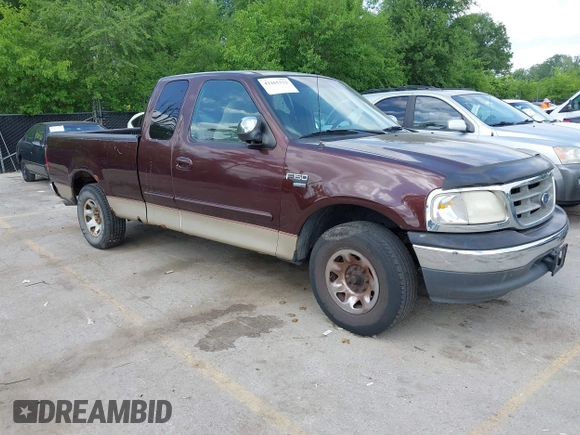 2000 Ford F-150 z VIN 1FTPX17LXYNA52377, wystawiony jako IAAI lot #42265332 z przebiegiem 220 971 mil mil oraz . Historia ofert i sprzedaży dostępna na DreamBid. Obrazek 1.