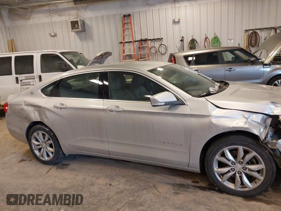 2018 Chevrolet Impala LT with VIN 2G1105S3XJ9102236, listed as a IAAI auction lot 41433120 with 113,476 mi miles and . Bid and sale history available at DreamBid. Image 13.