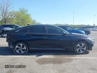 2020 Honda Accord EX-L with VIN 1HGCV2F57LA004141, listed as a IAAI auction lot 42136007 with 105,352 mi miles and . Bid and sale history available at DreamBid. Image 13.