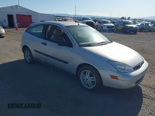 2000 Ford Focus ZX3 z VIN 3FAFP3137YR200780, wystawiony jako IAAI lot #42322264 z przebiegiem 170 436 mil mil oraz . Historia ofert i sprzedaży dostępna na DreamBid. Obrazek 1.