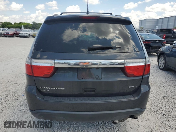 2013 Dodge Durango Crew z VIN 1C4RDJDGXDC696119, wystawiony jako Copart lot #58226905 z przebiegiem 154 915 mil mil oraz Czysty tytuł • Clean title. Historia ofert i sprzedaży dostępna na DreamBid. Obrazek 6.