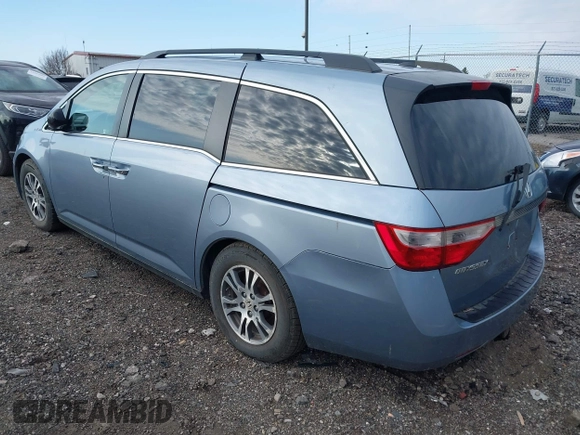 2012 Honda Odyssey EX-L with VIN 5FNRL5H60CB051959, listed as a IAAI auction lot 41967908 with Not Provided miles and . Bid and sale history available at carsss.com. Image 3.