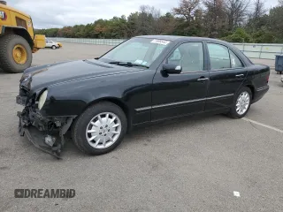 2001 Mercedes-Benz E-Class AWD with VIN WDBJF82J91X060969, listed as a Copart auction lot 71986544 with 113,694 mi miles and Salvage Title. Bid and sale history available at carsss.com. Image 1.