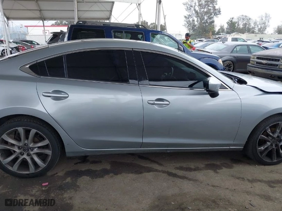 2017 Mazda Mazda6 Touring with VIN JM1GL1V59H1122054, listed as a IAAI auction lot 41896616 with 114,422 mi miles. Bid and sale history available at carsss.com. Image 14.