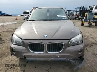2014 BMW X1 xDrive28i with VIN WBAVL1C5XEVY14142, listed as a Copart auction lot 46693985 with 70,504 mi miles and Salvage Title. Bid and sale history available at carsss.com. Image 5.