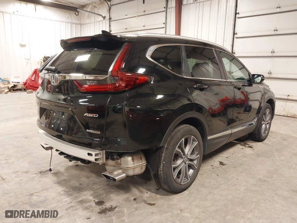 2021 Honda CR-V Touring with VIN 2HKRW2H9XMH653531, listed as a IAAI auction lot 41167970 with 32,228 mi miles. Bid and sale history available at carsss.com. Image 4.