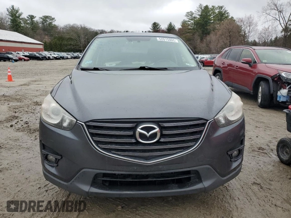 2016 Mazda CX-5 Grand Touring with VIN JM3KE4DY6G0834583, listed as a Copart auction lot 52015905 with 184,741 mi miles and Salvage Title. Bid and sale history available at DreamBid. Image 5.