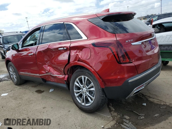 2023 Cadillac XT5 FWD Premium Luxury z VIN 1GYKNCRS5PZ173528, wystawiony jako Copart lot #55805605 z przebiegiem 7 789 mil mil oraz Szkoda całkowita • Salvage title. Historia ofert i sprzedaży dostępna na DreamBid. Obrazek 2.