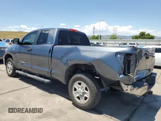 2010 Toyota Tundra with VIN 5TFUW5F14AX148898, listed as a Copart auction lot 63316765 with 79,983 mi miles and Salvage title. Bid and sale history available at DreamBid. Image 2.