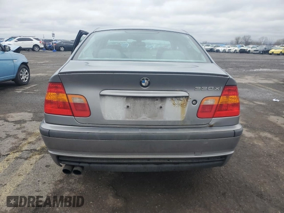 2005 BMW 3 Series 330xi with VIN WBAEW534X5PG11958, listed as a Copart auction lot 52908645 with 313,387 mi miles and Salvage Title. Bid and sale history available at DreamBid. Image 6.