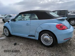 2013 Volkswagen Beetle 2.5L with VIN 3VW5X7AT4DM829494, listed as a Copart auction lot 47654065 with 34,987 mi miles and Salvage title. Bid and sale history available at DreamBid. Image 2.