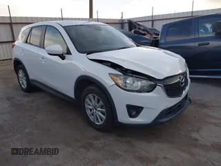2014 Mazda CX-5 Touring with VIN JM3KE2CY8E0321578, listed as a IAAI auction lot 41769930 with 101,724 mi miles. Bid and sale history available at carsss.com. Image 1.