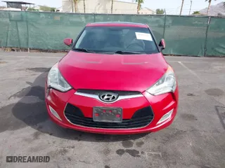 2013 Hyundai Veloster w/Black Int with VIN KMHTC6AD7DU117562, listed as a IAAI auction lot 41993745 with 106,780 mi miles. Bid and sale history available at carsss.com. Image 12.
