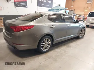 2013 Kia Optima EX with VIN 5XXGN4A74DG165525, listed as a IAAI auction lot 42405482 with 132,820 mi miles and . Bid and sale history available at DreamBid. Image 4.