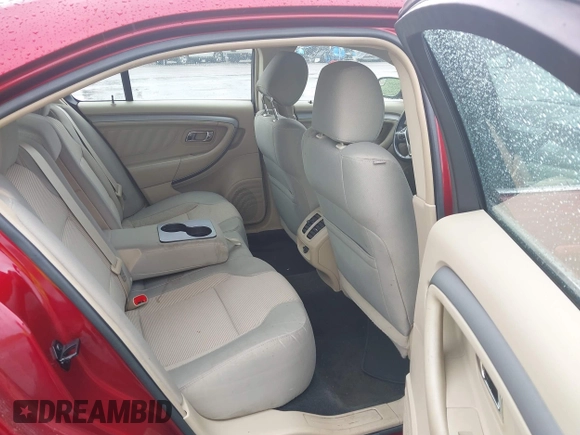 2014 Ford Taurus SEL z VIN 1FAHP2E83EG125622, wystawiony jako IAAI lot #42204238 z przebiegiem 134 032 mil mil oraz . Historia ofert i sprzedaży dostępna na DreamBid. Obrazek 8.