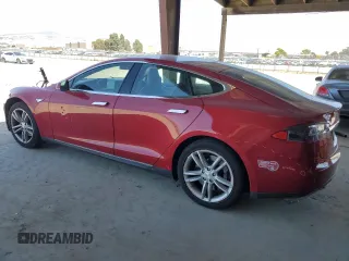 2013 Tesla Model S with VIN 5YJSA1AG5DFP12177, listed as a Copart auction lot 61846195 with 130,668 mi miles and Salvage title. Bid and sale history available at DreamBid. Image 2.