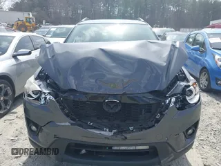 2015 Mazda CX-5 Touring with VIN JM3KE2CY2F0530204, listed as a IAAI auction lot 41788921 with 50,827 mi miles. Bid and sale history available at carsss.com. Image 12.