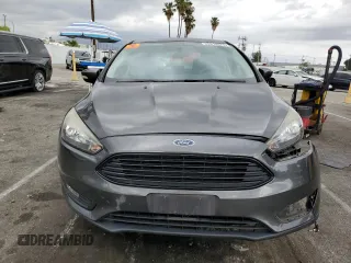 2017 Ford Focus SE with VIN 1FADP3FE3HL235896, listed as a Copart auction lot 50910975 with 74,502 mi miles and Salvage Title. Bid and sale history available at carsss.com. Image 5.