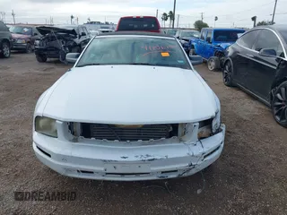 2007 Ford Mustang Deluxe with VIN 1ZVFT84N675266543, listed as a IAAI auction lot 41106799 with 132,127 mi miles and . Bid and sale history available at carsss.com. Image 13.