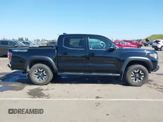2021 Toyota Tacoma SR z VIN 3TMCZ5AN3MM421868, wystawiony jako IAAI lot #42003665 z przebiegiem 39 380 mil mil oraz . Historia ofert i sprzedaży dostępna na DreamBid. Obrazek 13.