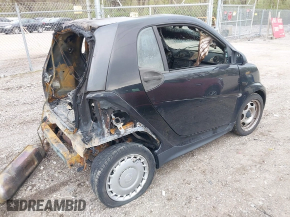 2015 Smart fortwo Passion with VIN WMEEJ3BA8FK811800, listed as a IAAI auction lot 41982401 with Not Provided miles and . Bid and sale history available at DreamBid. Image 4.