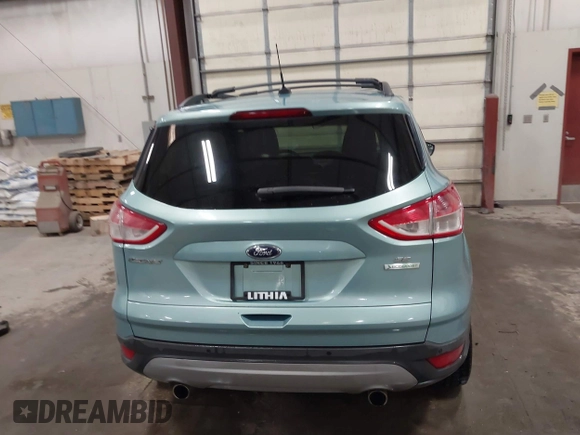 2013 Ford Escape SE with VIN 1FMCU0GX9DUB40739, listed as a IAAI auction lot 41633757 with 87,522 mi miles and . Bid and sale history available at DreamBid. Image 16.