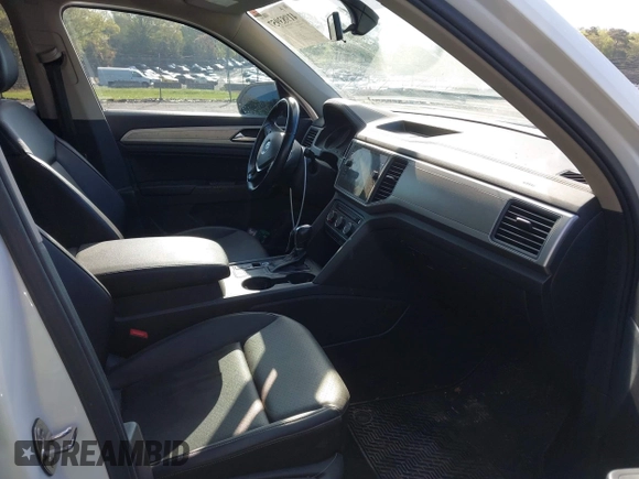 2018 Volkswagen Atlas SE with VIN 1V2CR2CAXJC548220, listed as a IAAI auction lot 41983957 with 118,371 mi miles and . Bid and sale history available at DreamBid. Image 5.