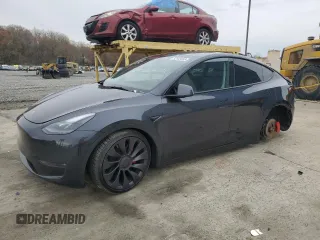 2024 Tesla Model Y Performance z VIN 7SAYGDEFXRA261508, wystawiony jako Copart lot #52849995 z przebiegiem Nie podano mil oraz Szkoda całkowita • Salvage title. Historia ofert i sprzedaży dostępna na DreamBid. Obrazek 1.
