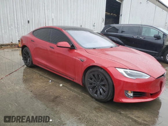 2016 Tesla Model S 90D with VIN 5YJSA1E24GF153482, listed as a Copart auction lot 52727105 with 91,396 mi miles and Salvage Title. Bid and sale history available at DreamBid. Image 4.