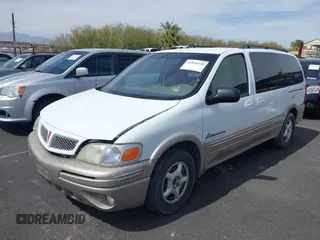 2002 Pontiac Montana with VIN 1GMDX03EX2D120237, listed as a IAAI auction lot 41858448 with 128,022 mi miles and . Bid and sale history available at DreamBid. Image 6.