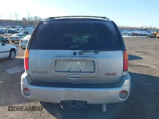 2005 GMC Envoy SLE with VIN 1GKDT13S452194933, listed as a IAAI auction lot 41426512 with 176,897 mi miles. Bid and sale history available at carsss.com. Image 16.