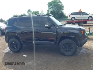 2015 Jeep Renegade Trailhawk z VIN ZACCJBCT9FPB36609, wystawiony jako IAAI lot #42593933 z przebiegiem 106 074 mil mil oraz . Historia ofert i sprzedaży dostępna na DreamBid. Obrazek 13.