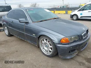 2001 BMW 3 Series 325Ci with VIN WBABN33461JW47585, listed as a IAAI auction lot 41568702 with 1 mi miles. Bid and sale history available at carsss.com. Image 1.