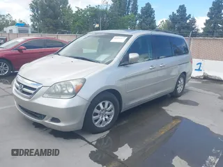 2007 Honda Odyssey EX-L with VIN 5FNRL38737B400745, listed as a IAAI auction lot 42211377 with 96,543 mi miles and . Bid and sale history available at DreamBid. Image 2.
